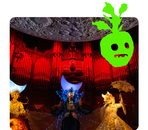 Derry Halloween celebration with costumed crowds and glowing lights.