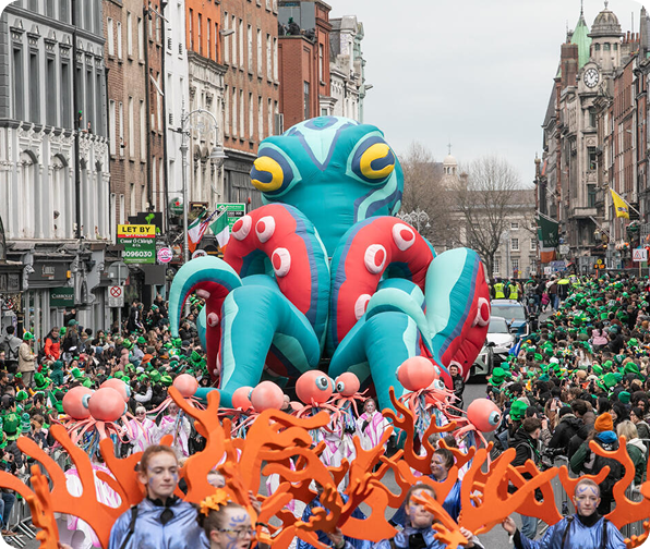 Large colorful octopus float moving down a city street during the St. Patrick's Day Parade in Dublin. Large colorful octopus float moving down a city street during the St. Patrick's Day Parade in Dublin.